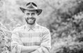 Hello. muscular ranch man in cowboy hat care plants. Eco farm worker. Harvest. happy earth day. Eco living. farming and Royalty Free Stock Photo