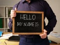 Hello My Name is... text on the board held by manager Royalty Free Stock Photo