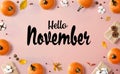 Hello November message with autumn pumpkins with present boxes Royalty Free Stock Photo