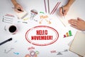HELLO NOVEMBER stamp. The meeting at the white office table Royalty Free Stock Photo