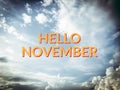 Hello November yellow word on sky and cloud background