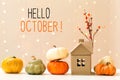 Hello October message with pumpkins with a house Royalty Free Stock Photo