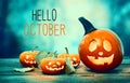 Hello October with pumpkins at night Royalty Free Stock Photo