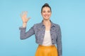 Hello! Portrait of friendly sociable woman in stylish casual clothes gesturing hi, welcoming with raised hand