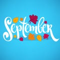 Hello September, bright fall leaves and lettering