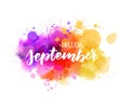 Hello September lettering on watercolor splash