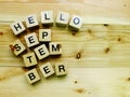 Hello september wooden block alphabet letters top view
