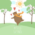 Hello Spring forest landscape. Cute bear in love spring sunny time dancing on green fresh grass.