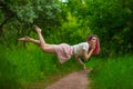 Hello Spring Gorgeous girl with raspberry hair among deer and flowers. Spring