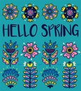 Hello spring greeting card with decorative flowers on blue background Royalty Free Stock Photo