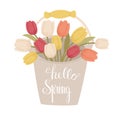 Hello Spring handlettering on the bucket of tulips