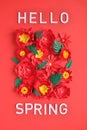 Hello, spring. With red paper flowers and green leaves Royalty Free Stock Photo