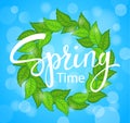 Hello Spring time wreath with green fresh leaves on blue background Royalty Free Stock Photo