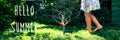 Child playing with garden sprinkler. Girl running, jumping. Lifestyle, authentic concept. Banner Royalty Free Stock Photo