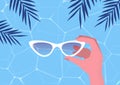 Hello summer. Hand holding sunglasses. Palms and sea. Vector