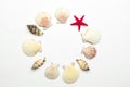 Hello Summer pattern background. Frame of White seashells, red starfish isolated on white backdrop. Top view travel or Royalty Free Stock Photo