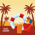 Hello summer seasonal scene with lifeguard float and sandbucket Royalty Free Stock Photo