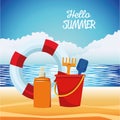 Hello summer seasonal scene with lifeguard float and sandbucket Royalty Free Stock Photo