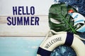 Hello summer text background top view on wooden background Royalty Free Stock Photo