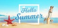 Hello summer text on beach sand surrounded by sea star, shells and message in the bottle Royalty Free Stock Photo