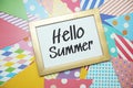 Hello Summer text on colorful background