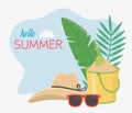 Hello summer travel and vacation hat sunglasses sand bucket leaves Royalty Free Stock Photo