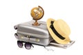 Hello summer. Womens accessories traveler: suitcase, straw hat, sunglasses and globe isolated on white background with empty space Royalty Free Stock Photo