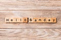 Hello sunday word written on wood block. hello sunday text on wooden table for your desing, concept Royalty Free Stock Photo