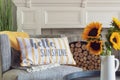 Hello sunshine pillow on a living room chair