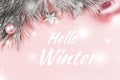 Hello winter greeting card with pastel pink Christmas background