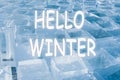 Hello Winter lettering inscription, ice square blocks winter background Royalty Free Stock Photo