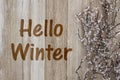 Hello Winter message on weathered wood