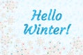 Hello Winter message with white snowflake on light blue