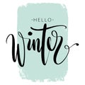 Hello winter phrase by hand on colorful background stroke. Hand drawn creative calligraphy and brush pen lettering