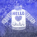 Hello winter text and knitted wool pullover with a heart. Seasonal shopping concept design for the banner or label. Royalty Free Stock Photo