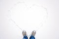 Hello winter, Winter season, Valentines day, love romance. Top view of hiking boots footprint in fresh snow. Two feet in Royalty Free Stock Photo