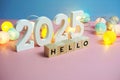 Hello 2025 word alphabet letters on pink and blue background Royalty Free Stock Photo