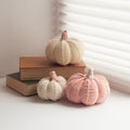 Helloween mood, knitted pumpkin front of window, soft light.