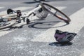 Helmet and bicycle on pedestrian crossing after accident