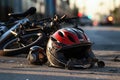 Helmet and bike lying on the road after a car hit a cyclist on a pedestrian crossing