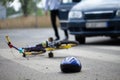 Helmet and bike on the steet after accident