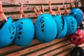 Helmet blue hanging on a rope. Rescue equipment. Equipment for human security. Head protection
