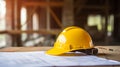 Helmet, blueprint and tools on a desk in a construction site. Drawing table for engineer, foreman and workman meeting and check a