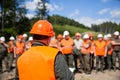 Helmet builder. Many construction workers helmet. Engineer team in hardhat for work. Worker group wearing vest, safety