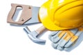 Helmet handsaw claw hammer gloves isolated on white Royalty Free Stock Photo