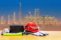 Helmet in industry site and Petrochemical oil refinery plant, site worker background safety first concept Royalty Free Stock Photo