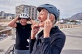 Helmet, laughter and a senior couple cycling outdoor together for fitness or an active lifestyle. Summer, exercise or Royalty Free Stock Photo