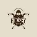 helmet and stick ice hockey logo vintage vector illustration template icon graphic design. winter sport sign or symbol with emblem Royalty Free Stock Photo