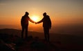 Help and assistance concept. Silhouettes of two people climbing on mountain and helping. Generative AI Royalty Free Stock Photo