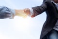 Help concept hand reaching out to help someone with sunlight Royalty Free Stock Photo